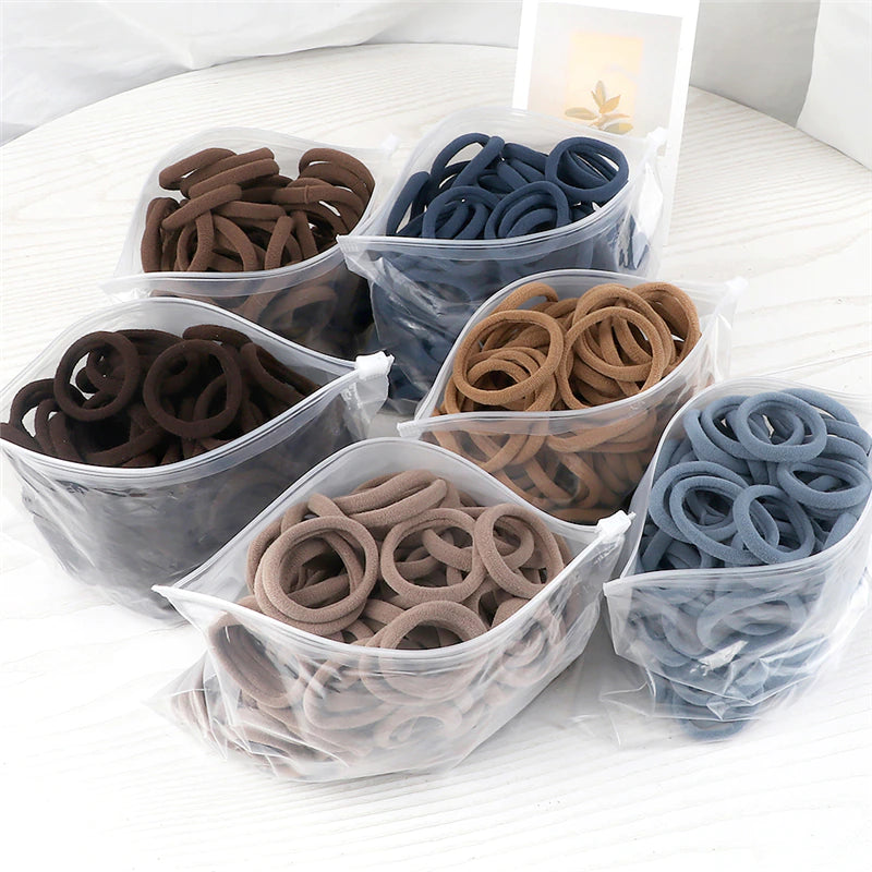 ChicLocks: 50-Piece Set of Women's Basic Elastic Hair Bands - Simple and Stylish Solid Colors for All-Day Comfort and Fashion-Forward Hairstyles!